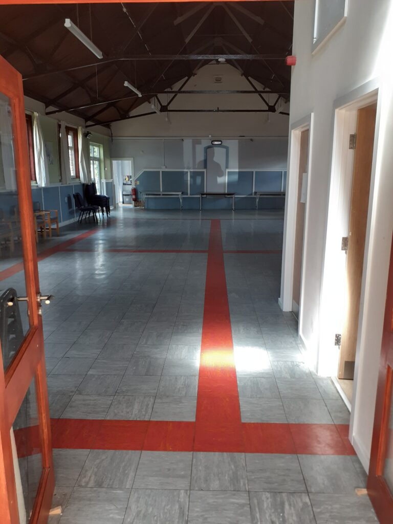 View from the entrance doors to the back of the hall